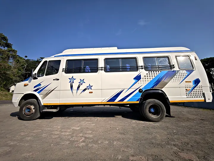 White Force tempo traveller with blue star graphics